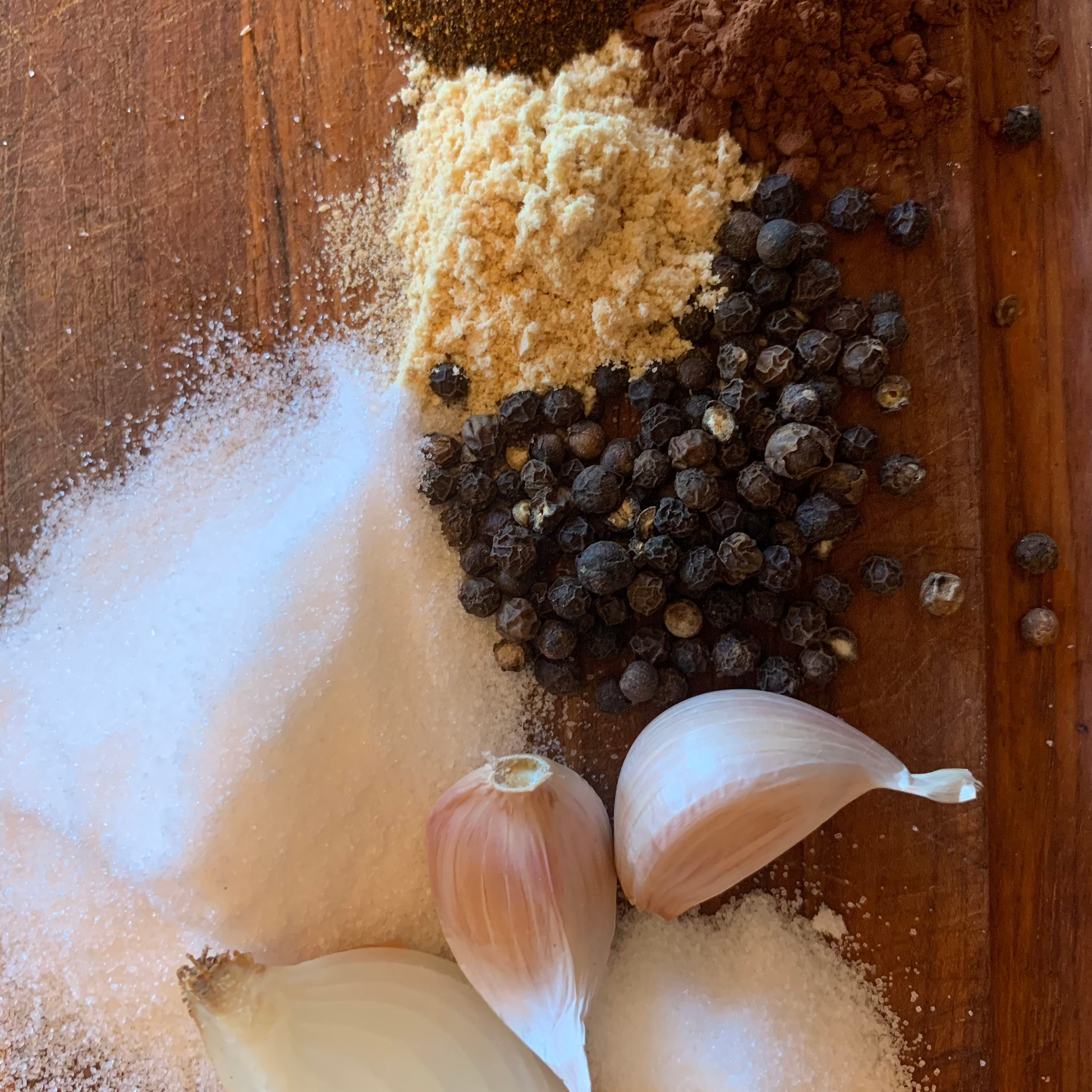 Seasoning blend ingredeints on the cutting board.