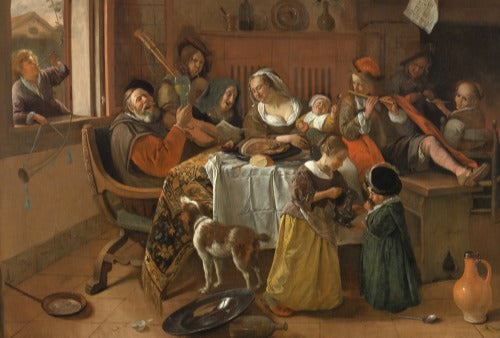 A happy family having a feast, drinking wine, playing music