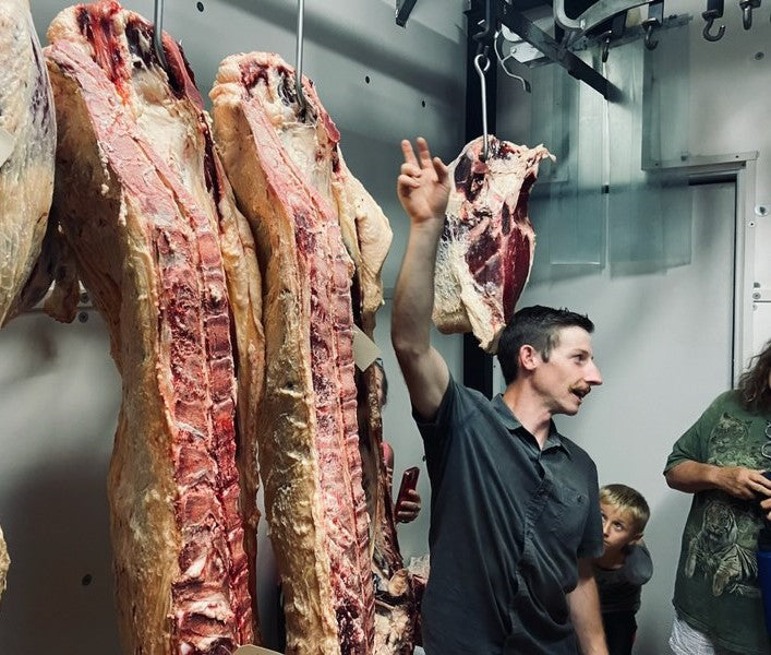 Melvin Hill Meats owner Craig Taffaro giving tour at Melvin Hill Meats facility in North Carolina.